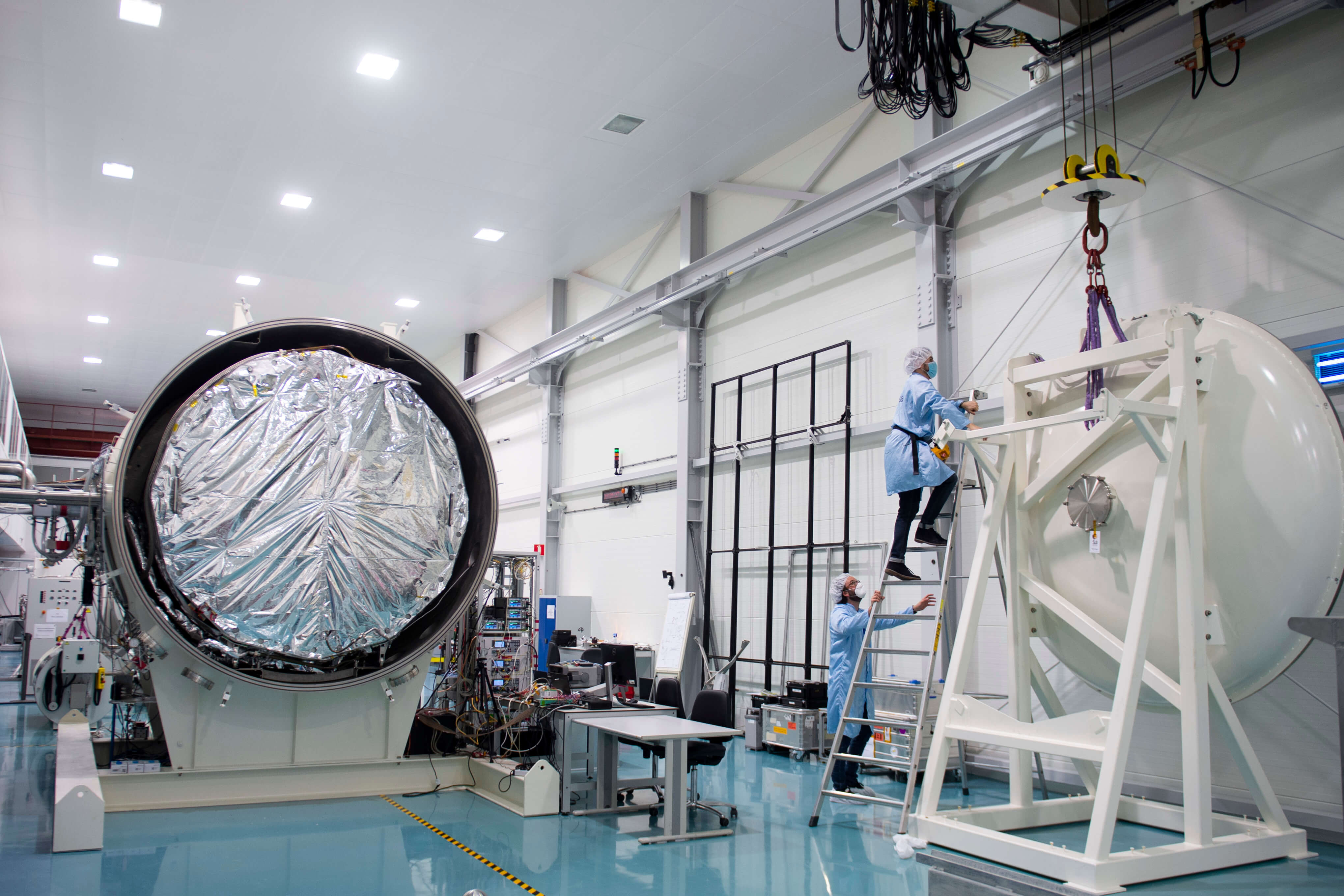 The large shiny foil disc encapsulates the test area that holds the antenna under test. Credits: ESA - G.Porter