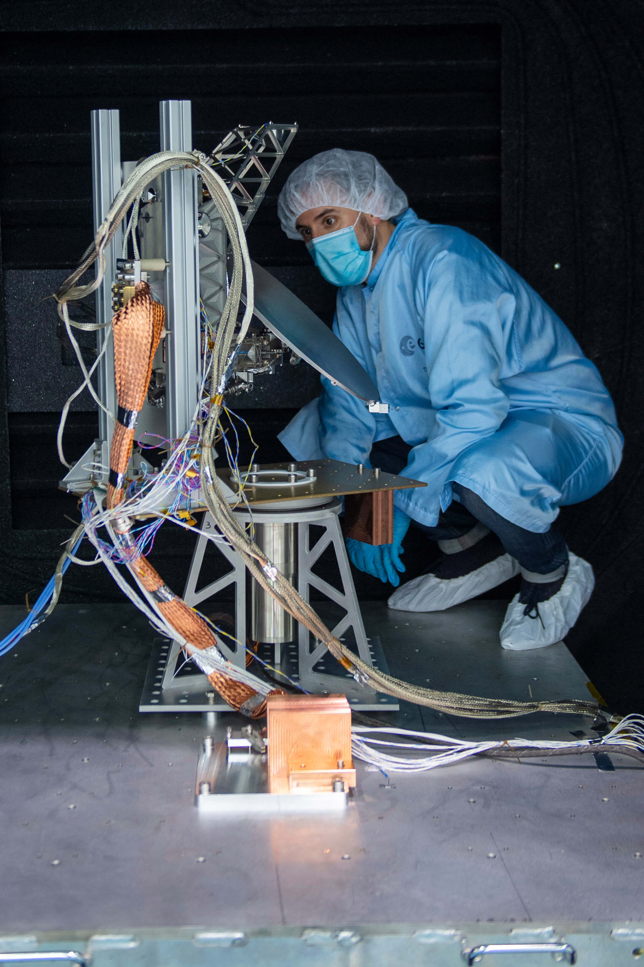 SWI instrument is visually inspected after testing to make sure that no physical change has occurred. Credits: ESA - G.Porter